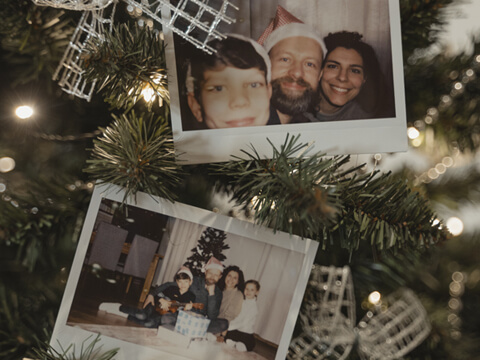 Polaroid photos on a Christmas tree