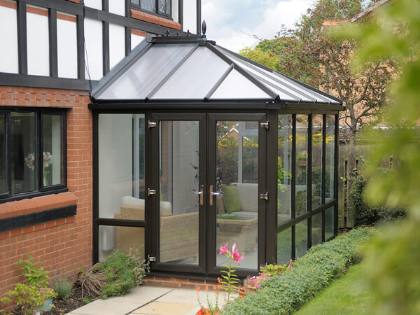 Small Black Conservatory with Polycarbonate Roof